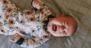 signs baby is too hot while sleeping