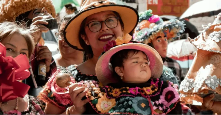 Baby girl in traditional Mexican dress and hat during celebration, symbolizing culture and popular Mexican names girl